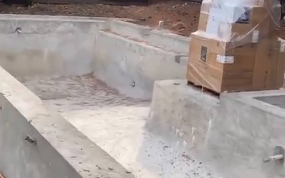 Poured concrete foundation walls and pads with anchor bolts, on a finished subgrade